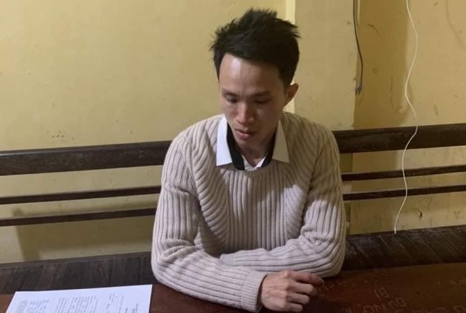 Đối tượng Lê Thanh Hưng tại cơ quan điều tra. Ảnh: Định Nguyễn.
