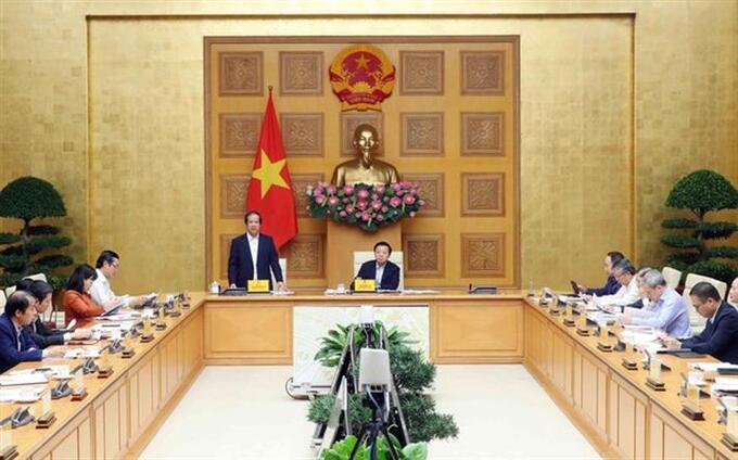 Bộ trưởng Bộ GDĐT Nguyễn Kim Sơn báo cáo tại cuộc làm việc. Ảnh: VGP