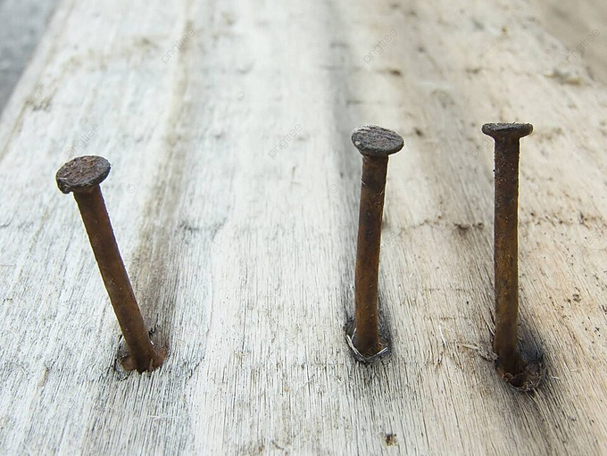 pngtree-rusty-nails-in-wood-plank-inside-texture-photo-image_1380379