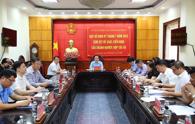 Đồng chí Phạm Quang Ngọc, Phó Bí thư Tỉnh ủy, Chủ tịch UBND tỉnh chủ trì buổi làm việc với các doanh nghiệp tháng 7/2022.