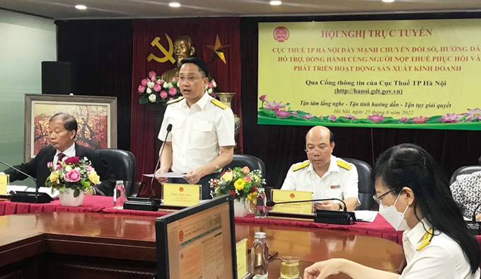 Cục trưởng Cục Thuế Hà Nội Mai Sơn phát biểu tại hội nghị hỗ trợ trực tuyến giải đáp vướng mắc về thuế năm 2022. Ảnh: Báo Hà Nội mới