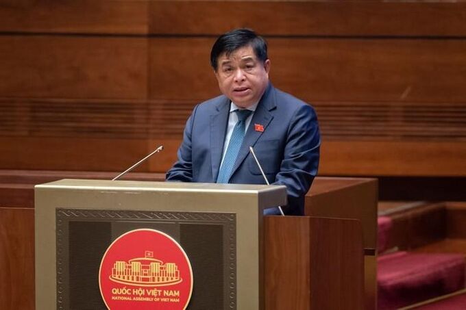Bộ trưởng Bộ Kế hoạch và Đầu tư Nguyễn Chí Dũng trình bày Tờ trình về dự thảo Nghị quyết của Quốc hội về thí điểm một số cơ chế, chính sách đặc thù phát triển Tp.HCM.
