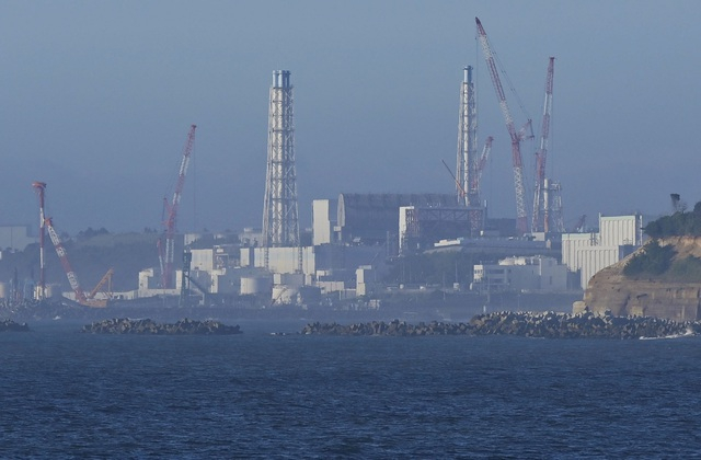 Nhà máy điện hạt nhân Fukushima nhìn từ thị trấn Namie thuộc tỉnh Fukushima (Nhật Bản) ngày 24/8. Ảnh: Reuters