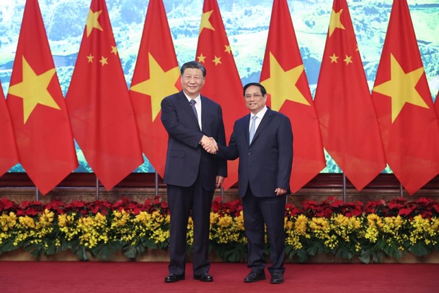 Thủ tướng Chính phủ Phạm Minh Chính và Tổng bí thư Ban chấp hành Trung ương Đảng Cộng sản Trung Quốc, Chủ tịch nước Cộng hòa nhân dân Trung Hoa Tập Cận Bình.