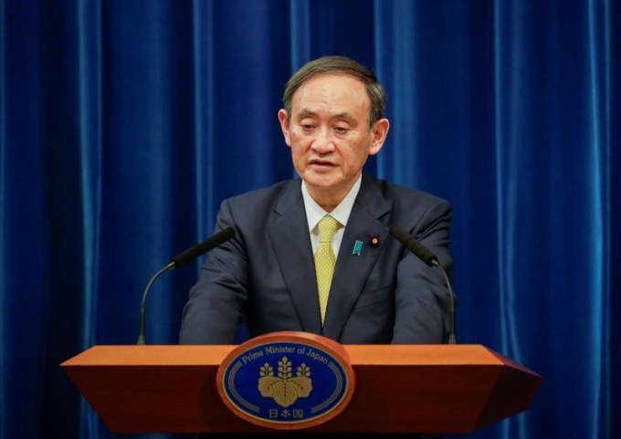 Thủ tướng Nhật Bản Yoshihide Suga trong một cuộc họp báo tại Tokyo hôm 4/12. Ảnh: Reuters