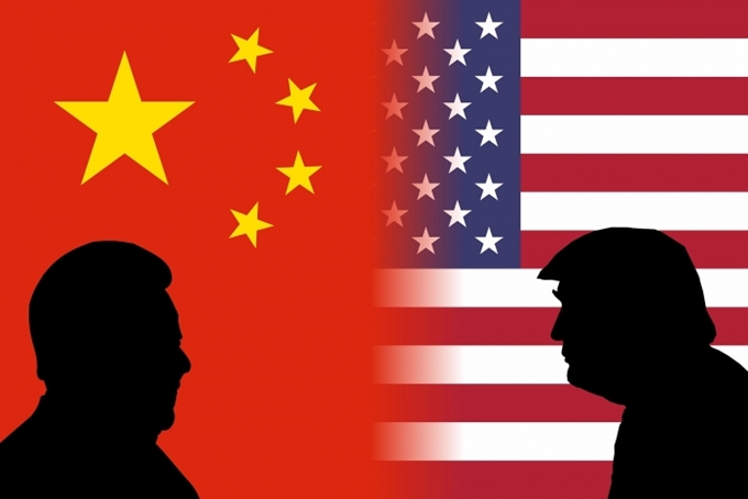 Mỹ và Trung Quốc liên tục áp dụng mức thuế quan “ăn miếng trả miếng” lên hàng hóa của nhau. (Ảnh: Vietnamfinance)