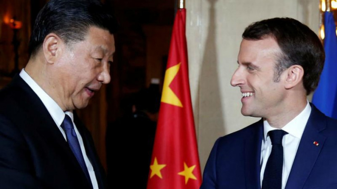 Tổng thống Pháp Macron và Chủ tịch Trung Quốc Tập Cận Bình. (Ảnh: AP)
