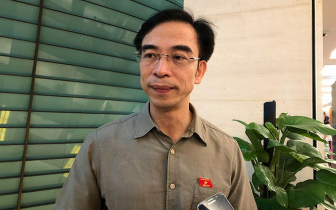 Ông Nguyễn Quang Tuấn bị bắt giam.