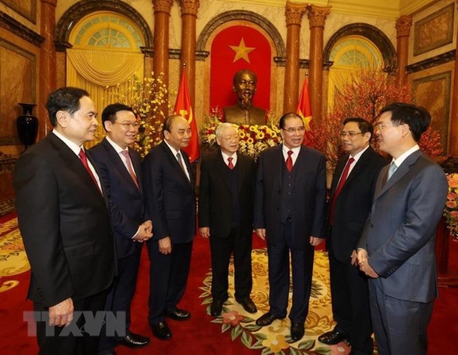 Tổng Bí thư, Chủ tịch nước Nguyễn Phú Trọng và Thủ tướng Nguyễn Xuân Phúc cùng các lãnh đạo và nguyên lãnh đạo Đảng, Nhà nước. (Ảnh: TTXVN)