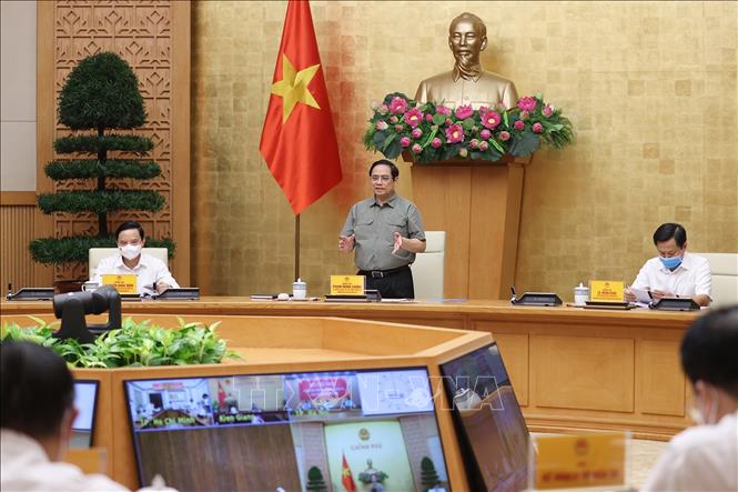 Thủ tướng Chính phủ Phạm Minh Chính họp Ban Chỉ đạo quốc gia phòng, chống dịch Covid-19. (Ảnh: TTXVN)