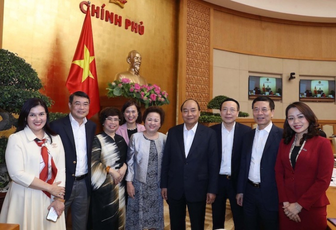 Thủ tướng Nguyễn Xuân Phúc trao đổi với đại diện lãnh đạo các tập đoàn kinh tế tư nhân ngày 12/3.