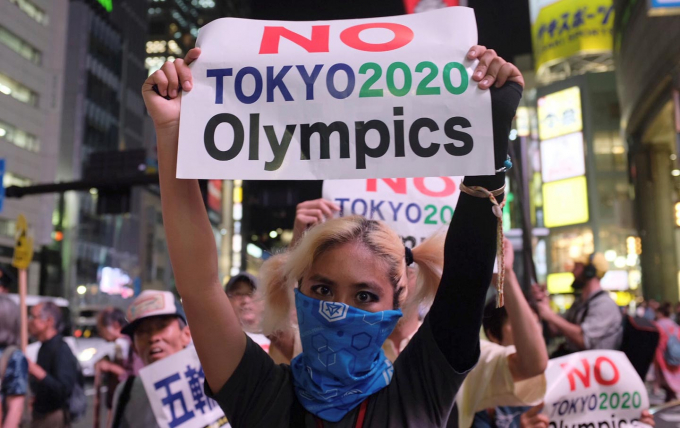 Người dân tuần hành ở thành phố Tokyo để kêu gọi chính phủ Nhật Bản hủy Olympic 2020. Ảnh: The Nation