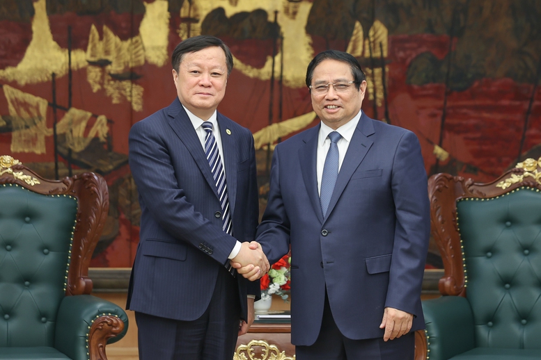 Thủ tướng Phạm Minh Chính tiếp Chủ tịch Tập đoàn tàu bay thương mại Trung Quốc- Ảnh 1.