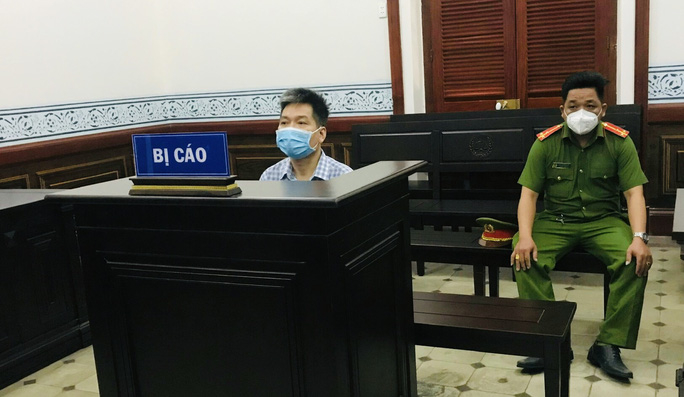 Nguyen Hoai Nam in court on April 5, 2022. Photo courtesy of the court.