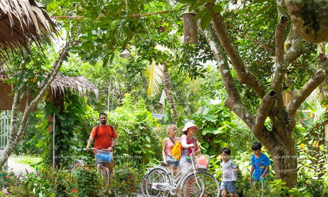 Tours to fruit orchards are a distinctive tourist attraction in Mekong Delta. Photo courtesy of Vietnam News Agency.