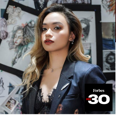  Tran Thi Bich Ngoc, 28, tattoo artist. Photo courtesy of Forbes Asia.