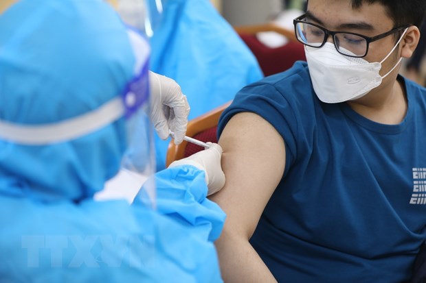 Covid-19 vaccination in Hanoi. Photo courtesy of Vietnam News Agency.
