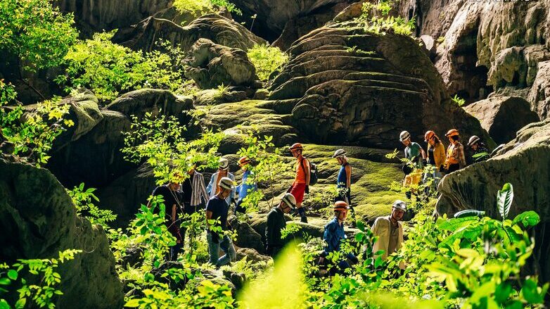 Tourists explore a mountain area in Phong Nha-Ke Bang National Park, Quang Binh province, central Vietnam. Photo courtesy of Oxalis.