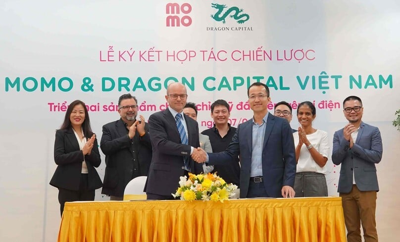 Executives of Dragon Capital and M-Service Co. embark on their partnership on June 10, 2022 in Ho Chi Minh City. Photo courtesy of M-Service.