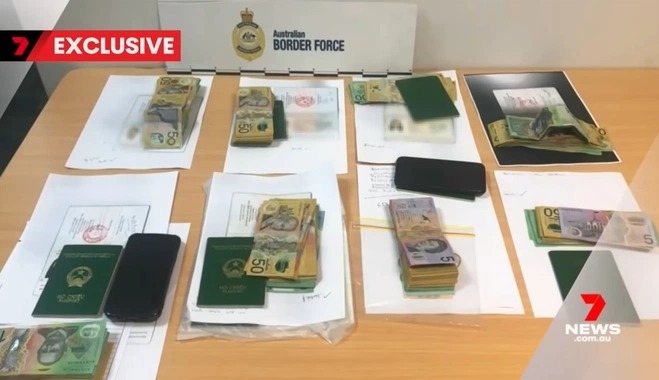 The Vietnam Airlines flight attendants' passports and cash as seen in the footage of 7News. Photo courtesy of 7News.