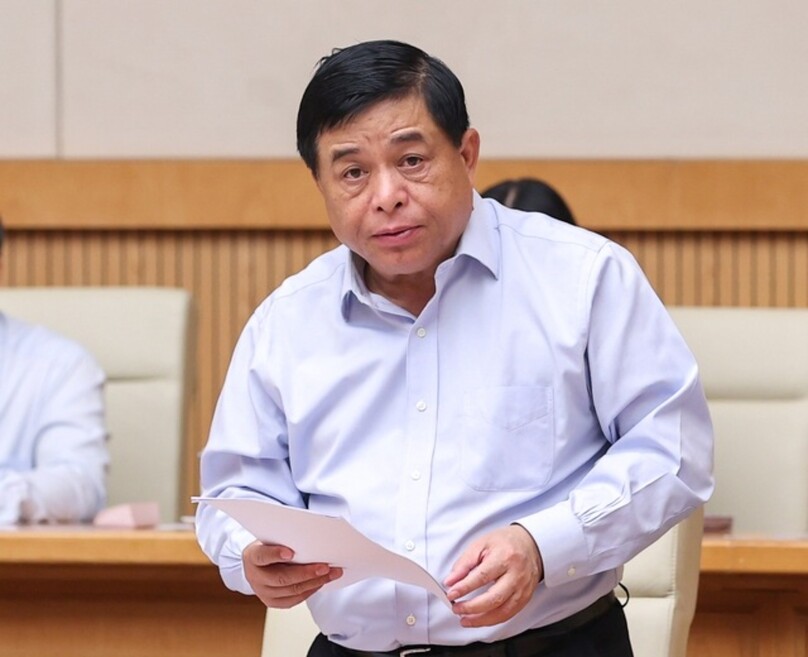 Minister of Planning and Investment Nguyen Chi Dung makes his presentation at a government meeting on July 4, 2022 in Hanoi. Photo courtesy of Vietnam News Agency.