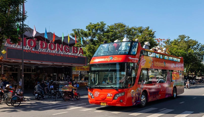 'City tour - Hue Heritage Journey' passing through Dong Ba market, the biggest market in Hue. Photo courtesy of Labor newspaper.