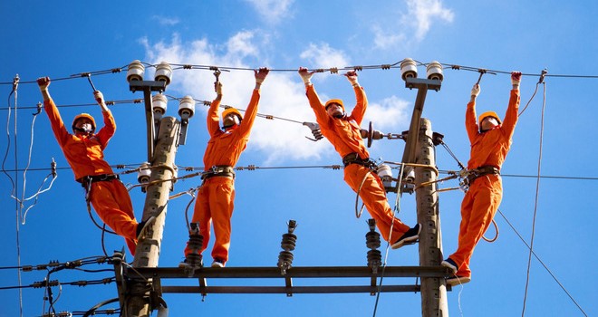 Electricity Vietnam (EVN) staff at work. Photo courtesy of the state utility.