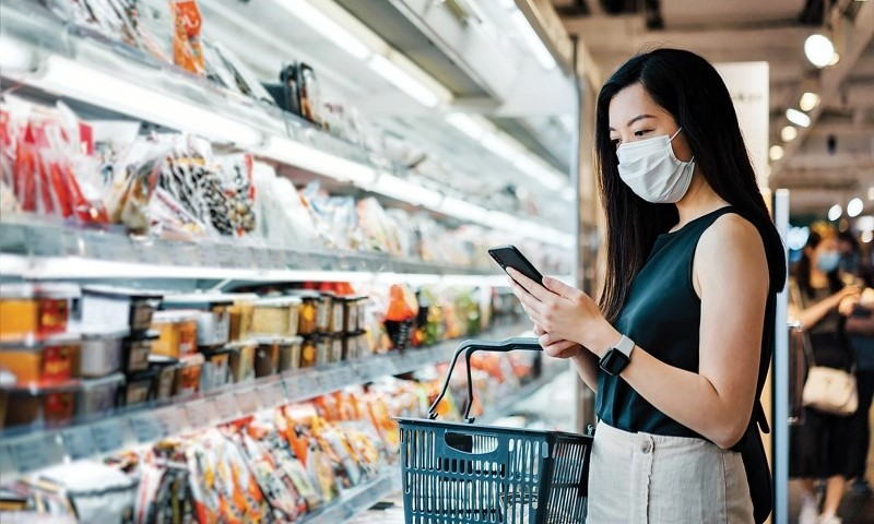 A shopper at a supermarket in Vietnam. Photo courtesy of Deloitte Vietnam.