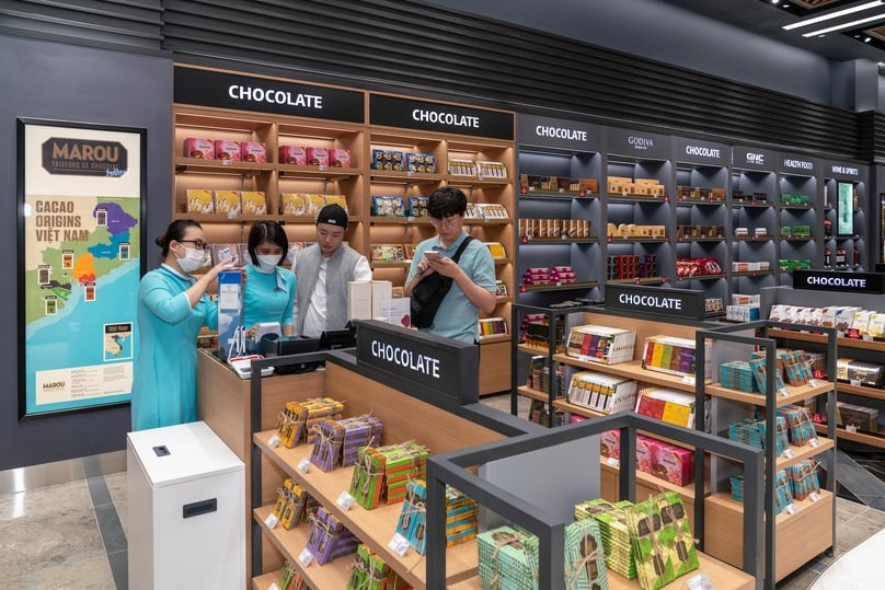 Shoppers at the new Lotte Duty Free store's chocolate counter in downtown Danang. Photo courtesy of Lotte.