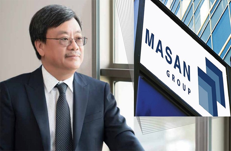 Masan Group chairman Nguyen Dang Quang and its sign. Photo courtesy of the corporation.