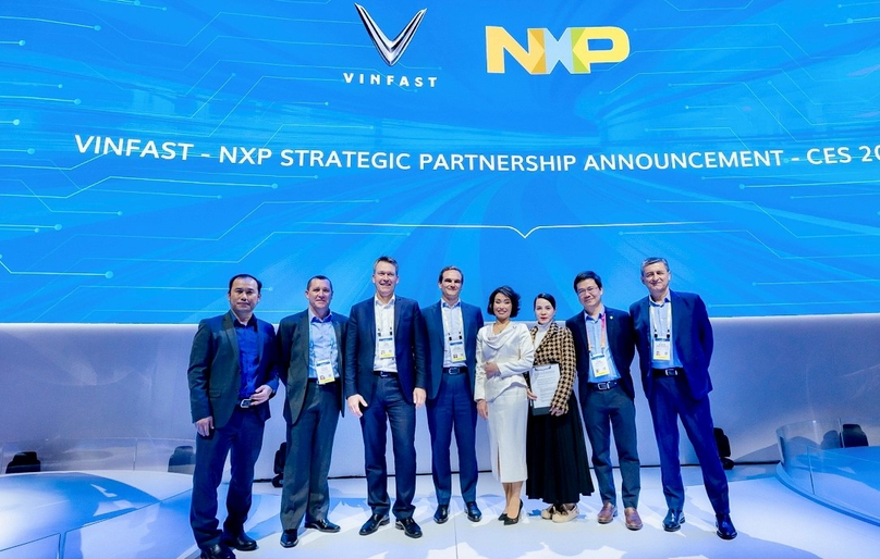 Representatives of VinFast and NXP Semiconductors pose for picture at CES 2023 when announcing their partnership. Photo courtesy of VinFast.