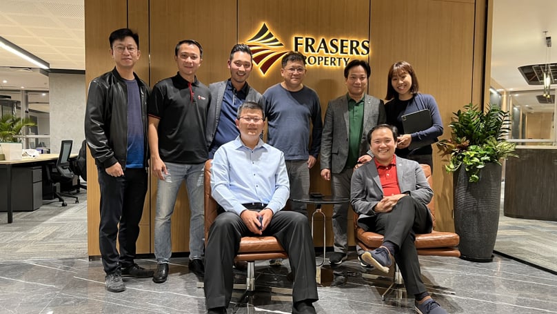 Frasers Property CEO Panote Sirivadhanabhakdi (right, front) and Frasers Property Vietnam CEO  Lim Hua Tiong (left, front) at the debut of their Hanoi office on February 6, 2023. Photo courtesy of the firm.