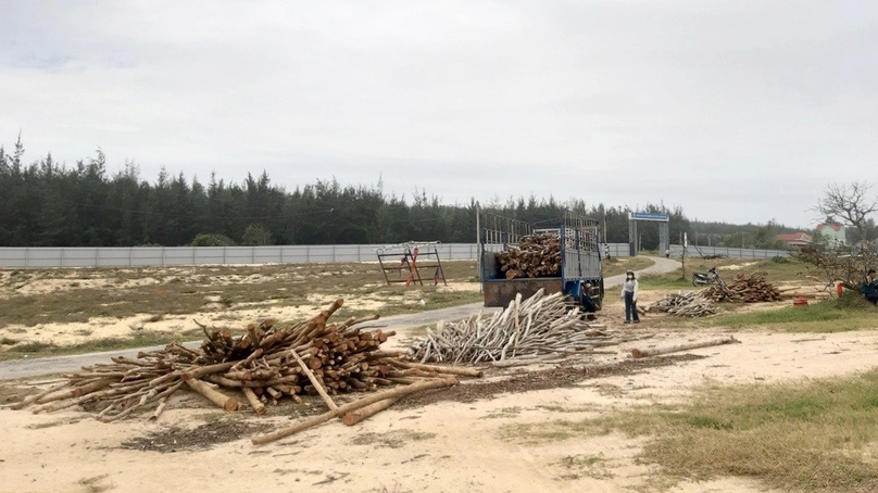 Local citizens utilize the area to store wood. Photo courtesy of The Investor/Nguyen Tri.