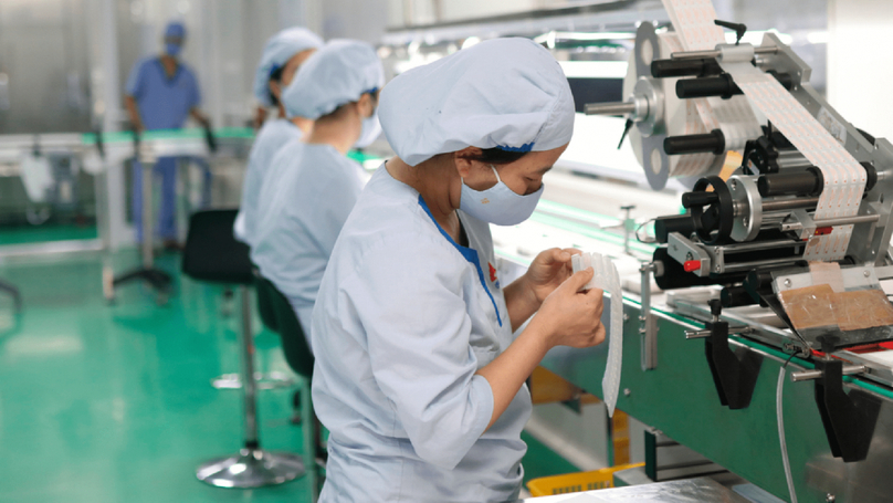 A production line of solvent for Pfizer vaccines at the Hanoi Pharma factory. Photo courtesy of the company.