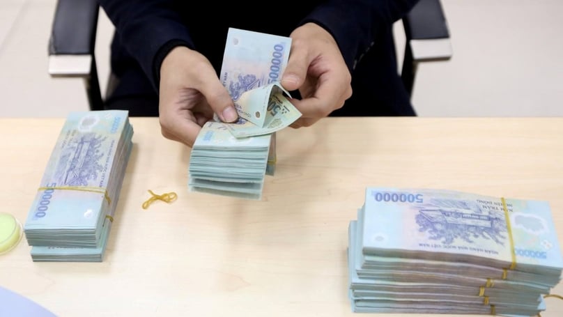 Many commercial banks have reduced their deposit interest rates by 0.2-0.5 percentage points from March 6, 2023. Photo courtesy of Vietnam News Agency.