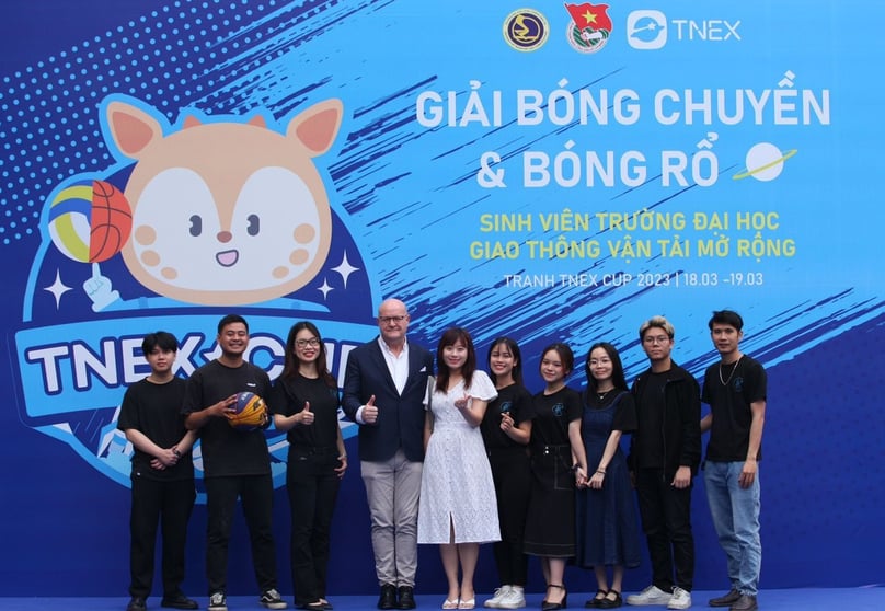TNEX CEO Bryan Carroll (4th from left) joins his staff at the University of Transport and Communications Hanoi TNEX volleyball and basketball cup on March 18-19, 2023. Photo courtesy of Carroll.