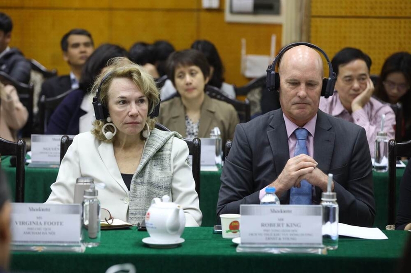Virginia Foote, Vice Chairwoman of AmCham in Hanoi (L), and Robert King, Indochina Tax Market Leader at EY, join a Global Minimum Tax conference held by The Investor in Hanoi on February 24, 2023. Photo by The Investor/Trong Hieu.