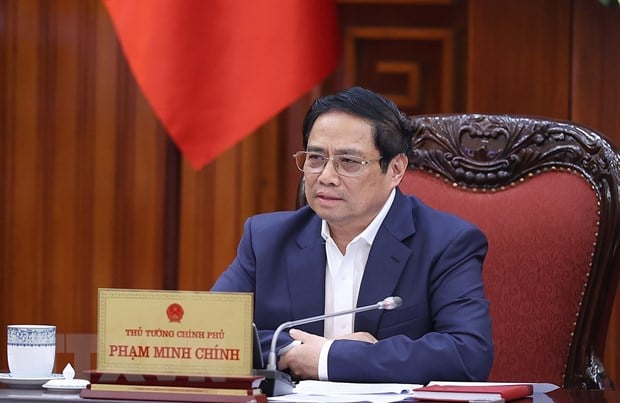 Prime Minister Pham Minh Chinh at the meeting with the State Bank of Vietnam on April 22, 2023. Photo courtesy of VietnamPlus.