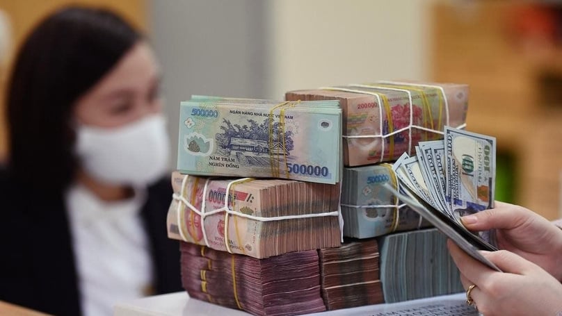Vietcombank's buying and selling rates were VND23,280 and VND23,620 per U.S. dollar respectively at 4.45 p.m on May 5, 2023. Photo courtesy of Auditing newspaper.