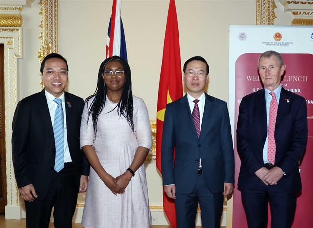 President Vo Van Thuong (third from left) and Vietnamese Ambassador to the UK Nguyen Hong Long (first from left) had talks with UK House of Commons Deputy Speaker Nigel Evans and UK Secretary of State for Business, Energy and Industrial Strategy Kemi Badenoch in London. Photo courtesy of Vietnam News Agency.