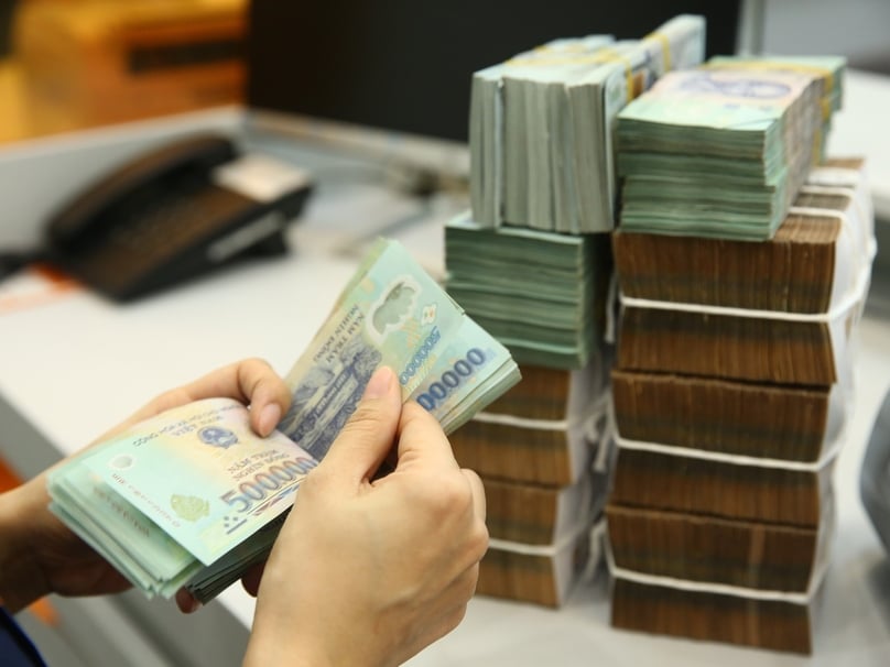 Non-performing loans may pose risks if there are not enough proper measures to deal with. Photo courtesy of Vietnam's Industry and Trade newspaper.