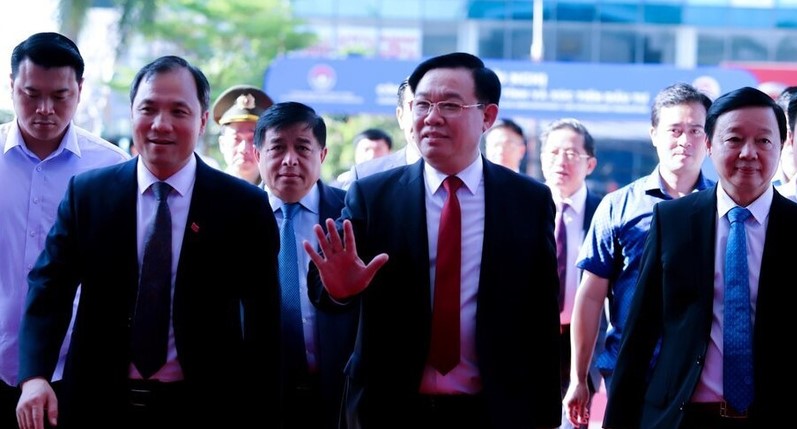 National Assembly Chairman Vuong Dinh Hue (center) and Deputy Prime Minister Tran Hong Ha (right) attend the investment promotion event in Ha Tinh province, central Vietnam on May 28, 2023. Photo by The Investor/Truong Hoa.
