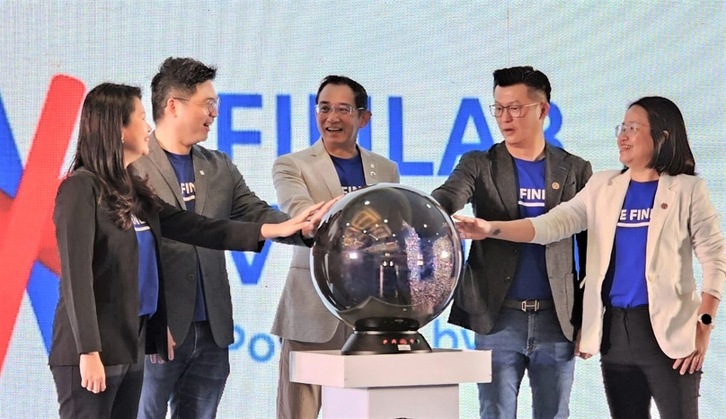 UOB Vietnam CEO Victor Ngo (central) launches UOB FinLab in Vietnam with his staff members on June 13, 2023 in Ho Chi Minh City. Photo courtesy of the bank.
