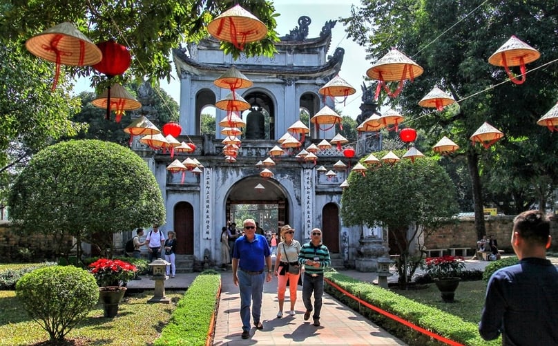 Foreigners visit Van Mieu - Quoc Tu Giam in Hanoi, the first university in Vietnam. Photo courtesy of Voice of Vietnam.