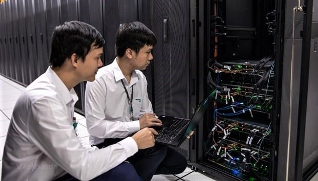 Viettel technicians work at a data center operated by the military-run technology group in Hanoi. Photo courtesy of Vietnam News Agency.