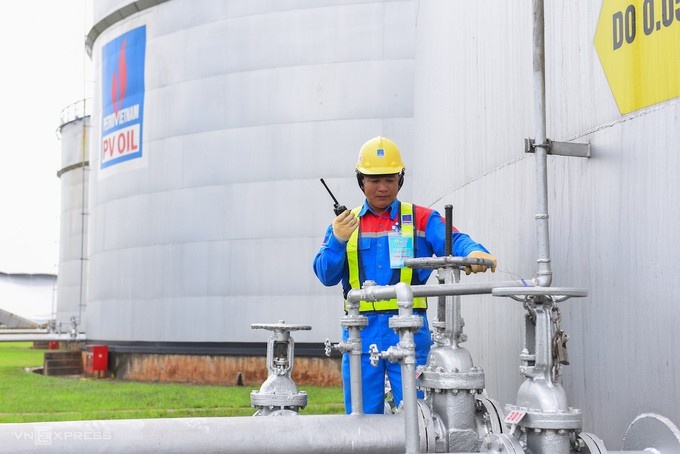 A technician at a storage facility maintained by PetroVietnam. Photo courtesy of the state-run oil and gas group.