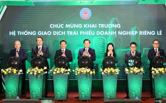 A ceremony to inaugurate Vietnam's trading system for private placement corporate bonds in Hanoi, July 19, 2023. Photo courtesy of Vietnam News Agency.