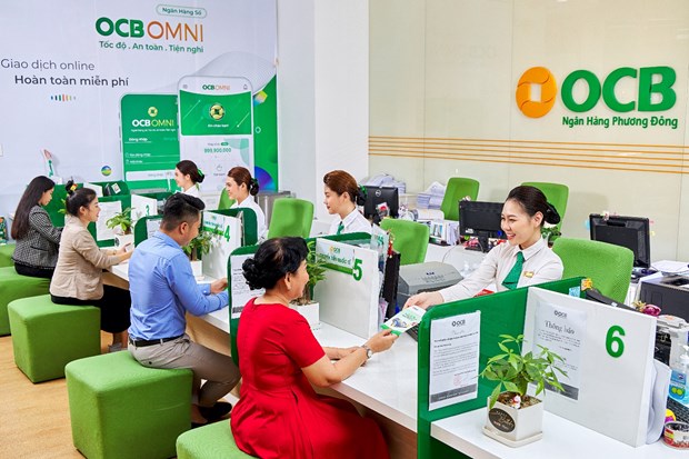 Customers at an OCB transaction office in Vietnam. Photo courtesy of Vietnam News Agency. 