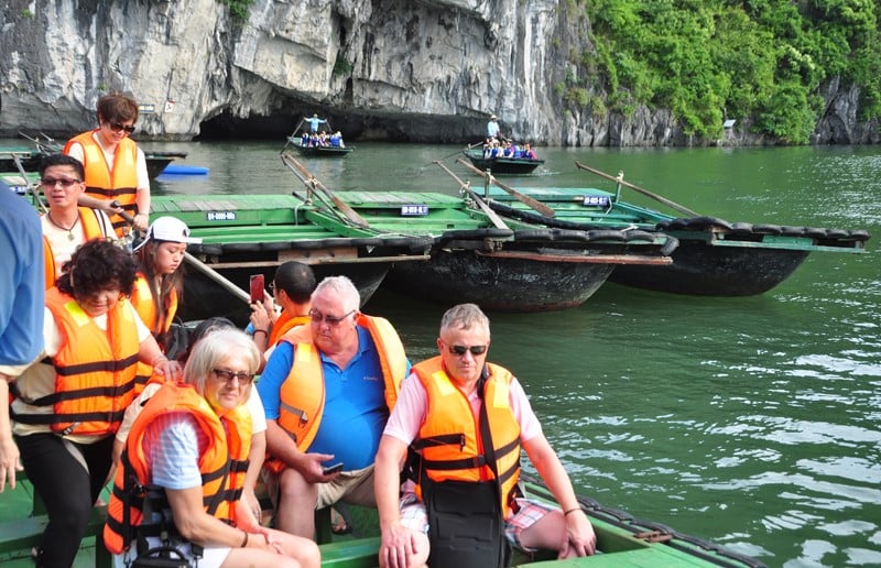 Foreign tourists take a boat ride on Ha Long Bay, northern Vietnam. Photo courtesy of Quang Ninh newspaper.