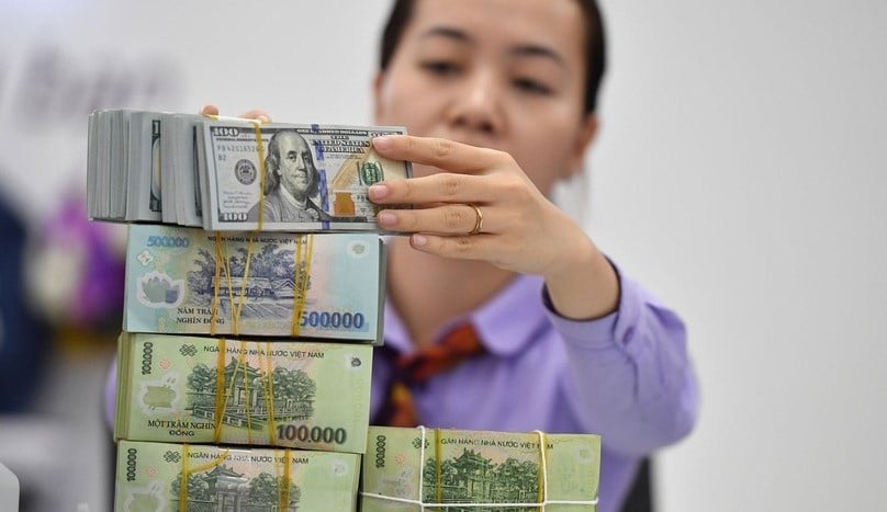 The USD/VND exchange rate is expected to remain stable in the remaining months of the year. Photo courtersy of Hoang Ha/VietNamNet.